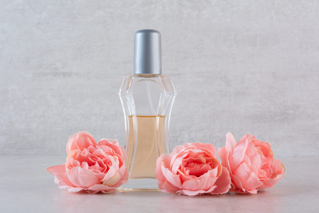 close up photo fragrance bottle with flowers1